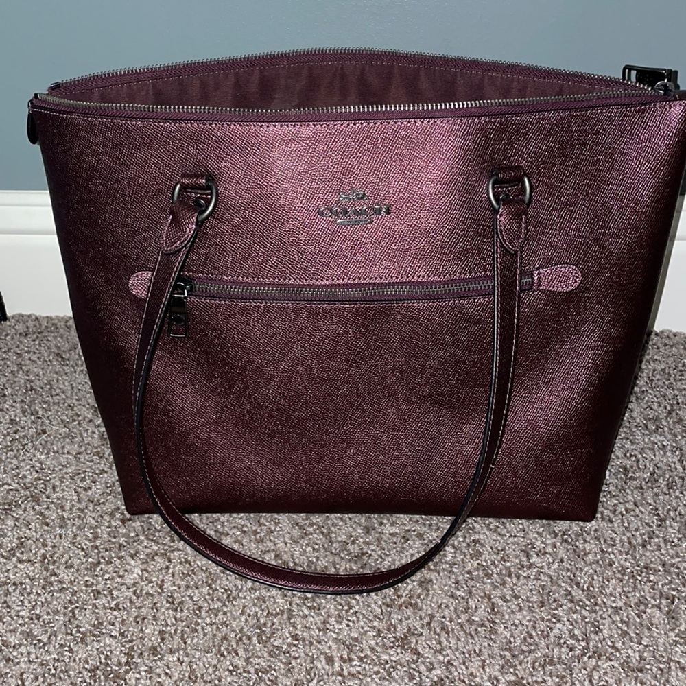 Burgundy metallic coach bag